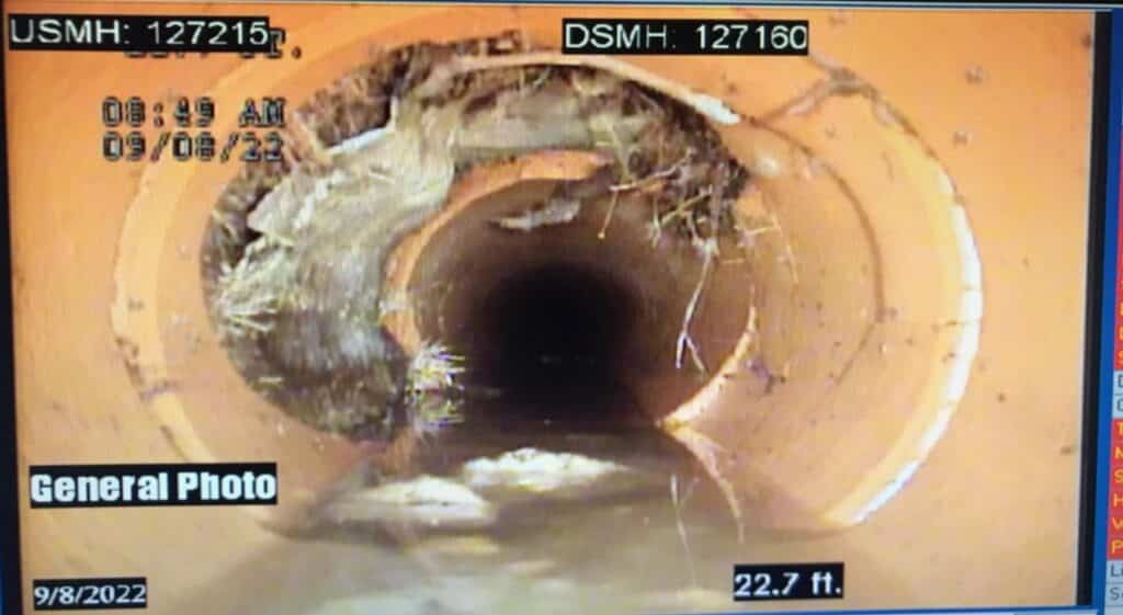 Before and after pipe lining lateral sealing transformation showing significant improvement in pipe condition.