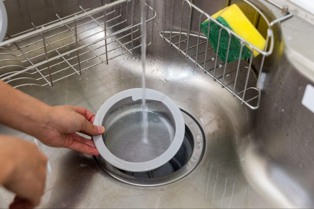 Easily clean your sink drain filter for better drainage and hygiene.